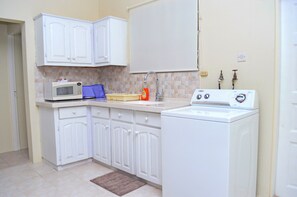 Fully equipped including washing machine.