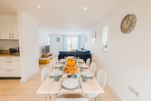 Dining table and chairs for 8, plus high chair available
