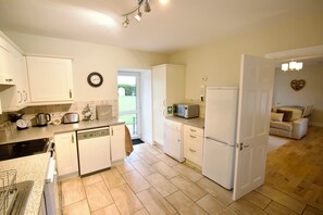 Kitchen with access to private rear garden