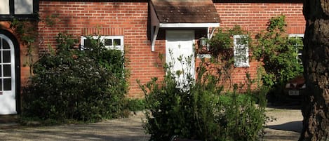 Stable Cottage at Holmfield as seen from lawns & gardens