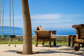 Unwind with sea views from your private garden, and endless Ionian waters!