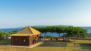 Wake up in a wooden hideaway above Kaminia Beach, with views of Zakynthos Island