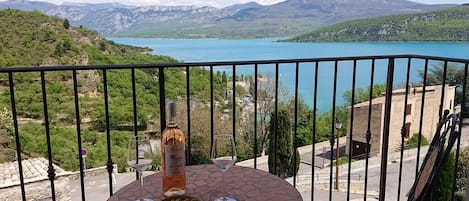 Balcony with stunning views of the lake and hills beyond