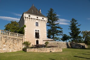 View of the terrace from the lower lawn, middle window is the living room.