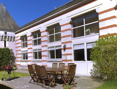 Set in the walled grounds of a Chateau with 5 acres of land and a shared pool 