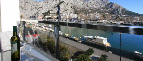 view from the balcony to the town, river and the see