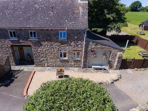 Winterton Cottage from above with fenced garden to the right