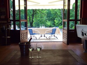 Relax in the bar or outside by the pool in one of the many shaded seating areas