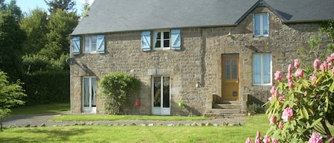 Guest House to the left of the front door.