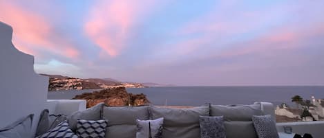 Food or drinks on the main terrace at sunset
