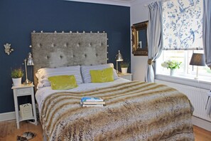 Master bedroom with King Size bed and large wardrobe 