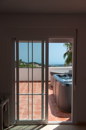 Bedroom with patio dooors to out side terrace area