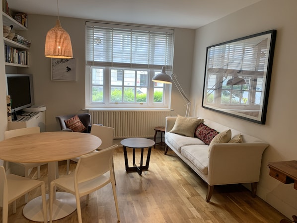 Open plan living area opposite kitchen