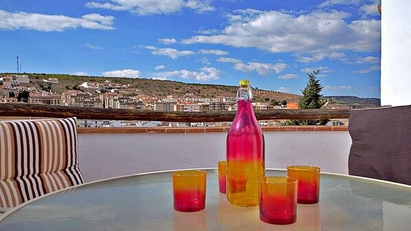 Sunny terrace just off the kitchen so you don't have to go far for a top up!