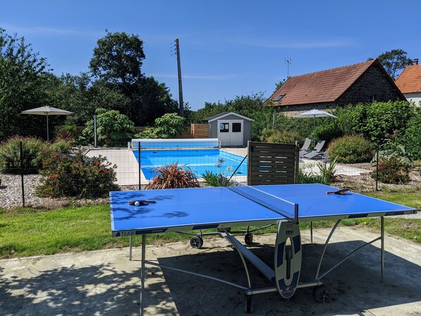 Table tennis by the pool