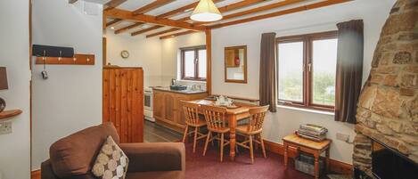 Stable cottage open plan kitchen/lounge and dining area overlooking our lakes