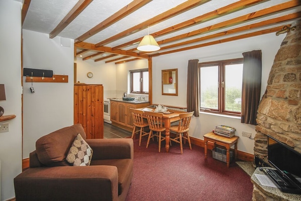 Stable cottage open plan kitchen/lounge and dining area overlooking our lakes