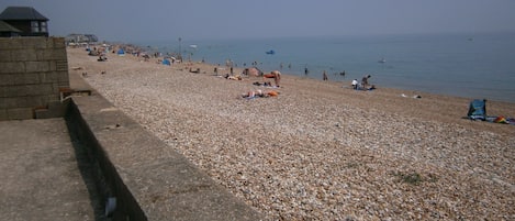 Summer day on the beach, from the garden