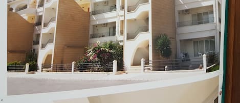 View of the apartment viewed from the ample car parking space car park 