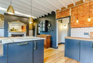 Kitchen  with integrated dishwasher and fridge. Freezer & microwave also