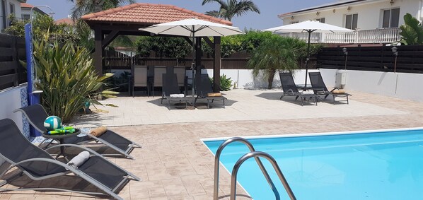 Large patio surrounding the 3.5 x 7 metre pool.