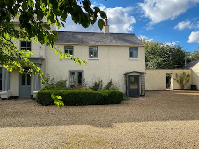 18th Century Cottage: Private terrace overlooking large walled garden.