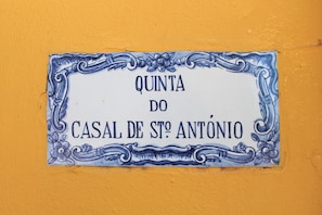 A traditional Portuguese tile identifying our property at the gate