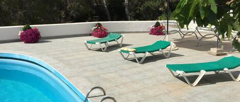The 220 sq.m. private pool terrace (not overlooked). Parasols hammocks & flowers