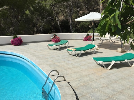 The 220 sq.m. private pool terrace (not overlooked). Parasols hammocks & flowers