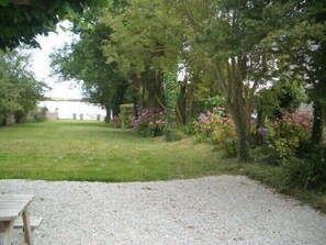 The garden leading to the laguna and the beach, from the house.