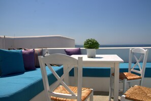 Upper terrace . Coffee or Ouzo?