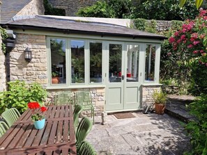 The entrance to the cottage into the kitchen from the private courtyard.