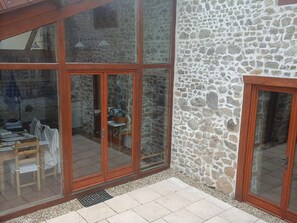 lower patio and entrance to kitchen