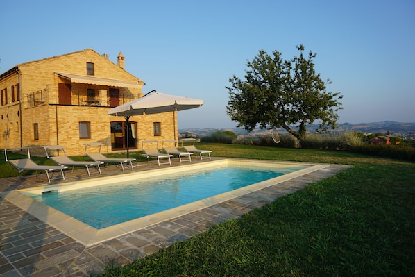Lovley pool area with 6 sun beds