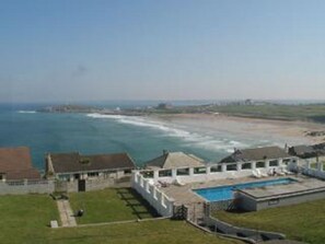 Communal gardens and swimming pool just at the back of the house 