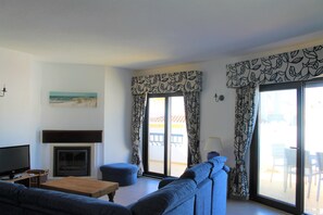 The living room leading onto the main terrace