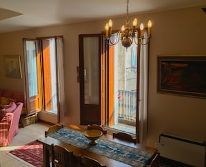 Living & Dining area with french windows & balcony