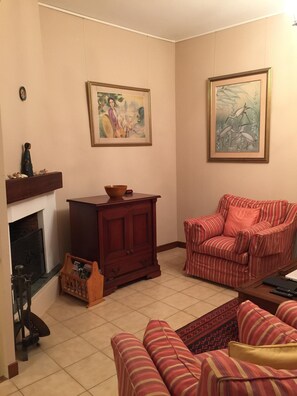 Living area with fireplace, TV, Video, music, games and internet