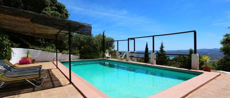 Stunning panoramic views from the huge private swimming pool