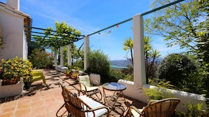 Lots of different terraces set amidst flowery gardens, all with beautiful views