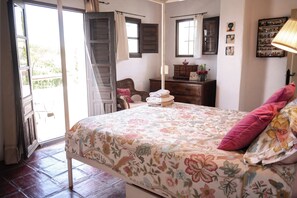 French doors to the roof terrace from the master bedroom