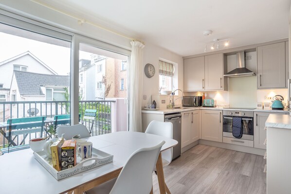 Kitchen breakfast room with access to balcony