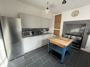 New fully fitted kitchen with dishwasher, fridge + additional fridge freezer