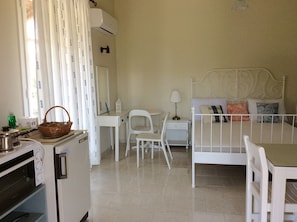 A studio is designed in gentle, light colors. Spartia Kefalonia apartments