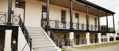 Exterior view of duplex apartment in grade II listed military barracks.