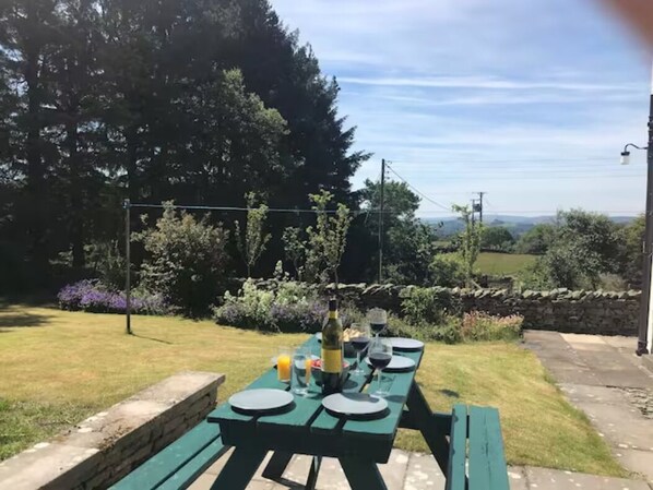 Spacious rear garden with patio doors to lounge great for families