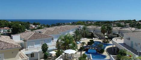 Stunning views across pools and complex to sea beyond