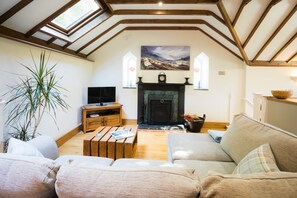 The Old Chapel - Lounge area with woodburner