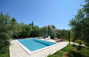 Swimming pool and house