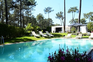 Pool with sunbathing area